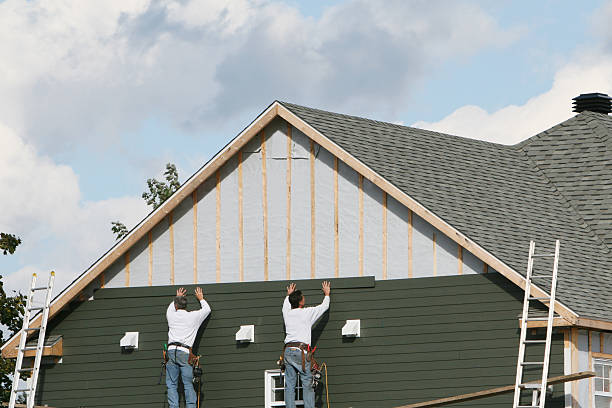 Professional Siding technician working in Danville, IL